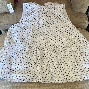 Beautiful flower stamp,ruffled neck and bottom area,light weight 100% cotton